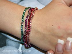 AR008 Multisparkle: Armband med elastiskt band i 4 frger...65:- SLD