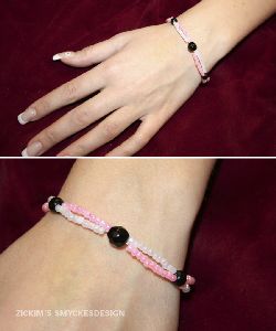 SE012 Tworow: 2 radigt armband i rosa och vitt + tillhrande rhngen...70:- SLD