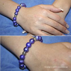 AR014 Purplepill: Armband med elastiskt band med lila drizzle prlor...80:- SLD