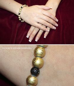 AR020 Gold drizzle: Armband med elastiskt band med drizzle prlor i guld...60:- SLD