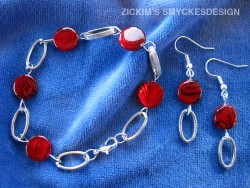 SE030 Red chain: Armband och örhängen med häftiga röda platta pärlor...75:- SÅLD  
För att se en större bild, klicka på denna länk.  
Lägg till bildtext
textarea cant be used in forms style=