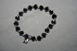 AR137 Black facett: Elastiskt armband med svarta facetterade prlor...90:- SLD
Fr att se en strre bild, klicka p denna lnk.