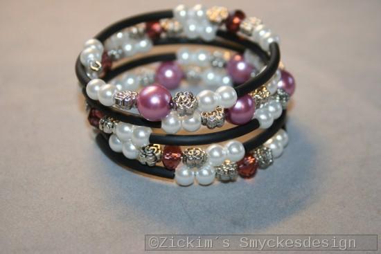 AR165 Swarovski memory: Armband av memorywire med lila swarovski prlor...105:- 75:-