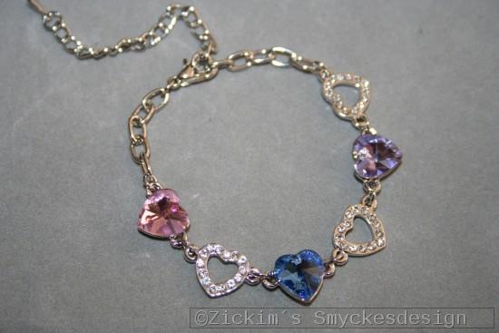 G10: Armband med hjärtan med äkta swarovski stenar i olika färger...129:- SÅLD 
