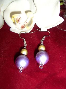 OR008 Big purple: rhngen med stor lila prla och mindre i guld...60:- SLD